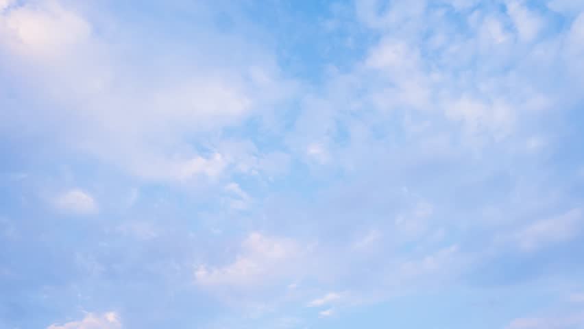 Clouds Moving Across Blue Sky Timelapse