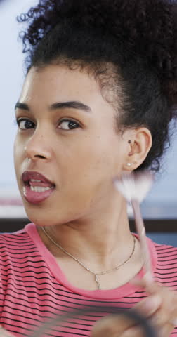 Beauty, influencer and woman with makeup tutorial, talk and advice for audience, live stream or web. Home, content creator and POV with review for cosmetics, chat or tips for fans on social media