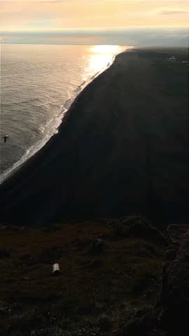 Moody Seaside Horizon with Waves and Sunset Sky