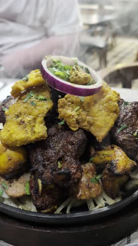 Sizzling mixed grill from an Indian restaurant 