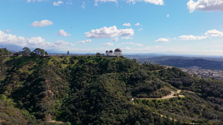 Griffith Observatory aerial drone shot moving left to right over Hollywood Hills, February 20, 2026
