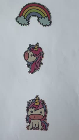 Cute cartoon unicorn and rainbow stickers on white background – seamless loop decorative video