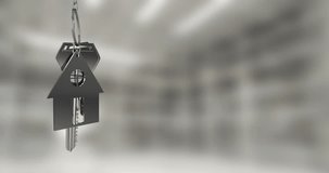 Animation of silver house keys hanging against blurred background with copy space. Relocation and real estate concept - Powered by Shutterstock - Get 15% off with code: PIKWIZARD15