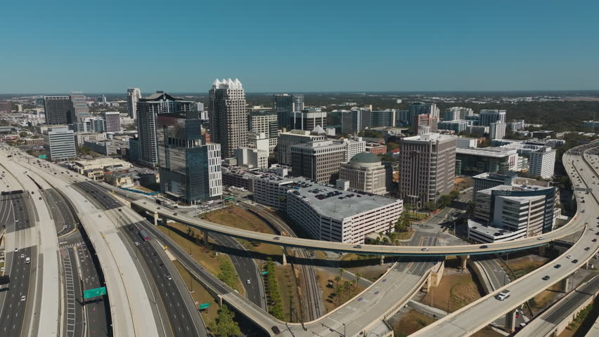 Push-out clip zooming away from downtown Orlando.