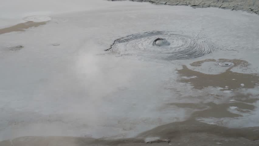 Volcanic Steam Rising With Bubbling Geothermal Mud Pools In Iceland. Close-up Shot