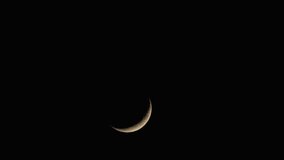 Crescent moon phase bright against the dark night sky telephoto lens - Powered by Shutterstock - Get 15% off with code: PIKWIZARD15
