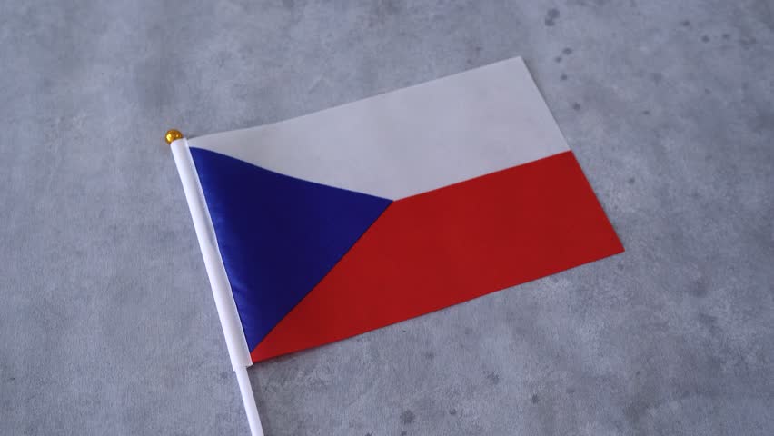 Czech Republic flag close up on gray background. Czech national flag.
