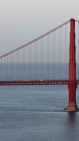 Golden Gate Bridge over Pacific Ocean in San Francisco, California at sunset aerial view. g.