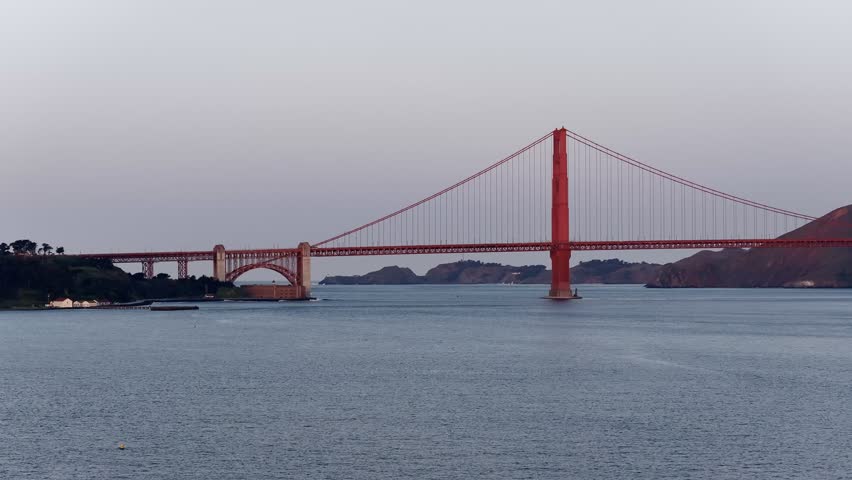 Golden Gate Bridge over Pacific Ocean in San Francisco, California at sunset aerial view. g.