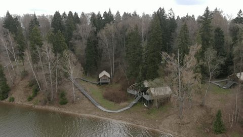 Drone Pulling Back above Riverside Forest Glamping