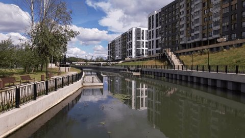 Ascending Drone Flight over River Rafinad Housing