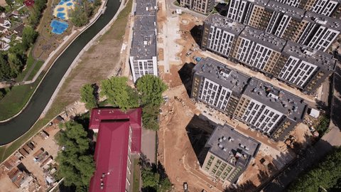 Drone Flying Forward Tilting over Residential Complex