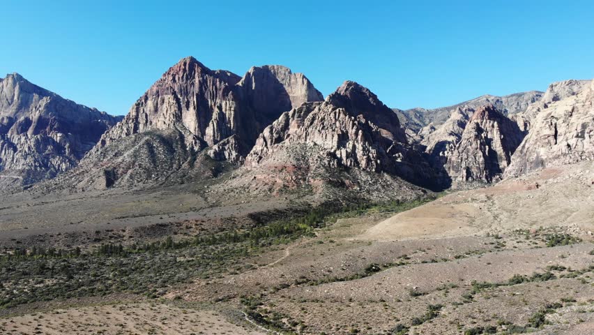 Aerial approach to the Nevada mountains at Red Rock National Conservation Area near Las Vegas Nevada