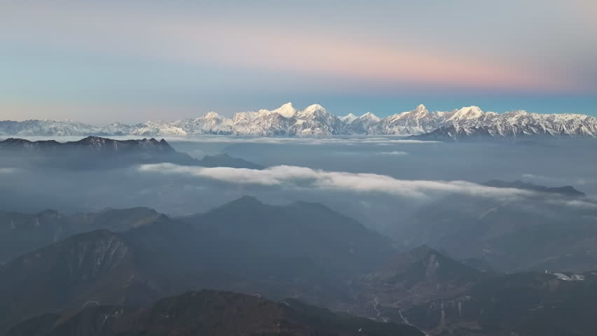 Aerial view of Mount Gongga and Hengduan Mountains at dawn, Western Sichuan, China