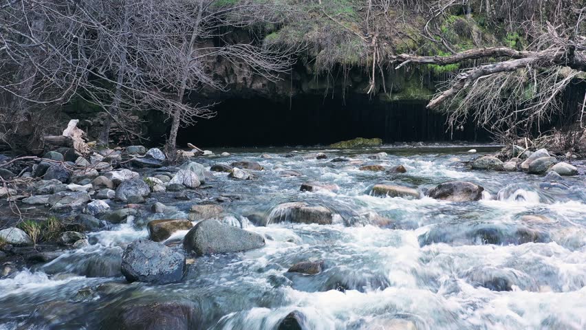 This drone video clip is located at the Natural Bridges at Coyote Creek near Murphy's California. Inside of the cave there is an underground swimming pool with a great deal of water falling inside.