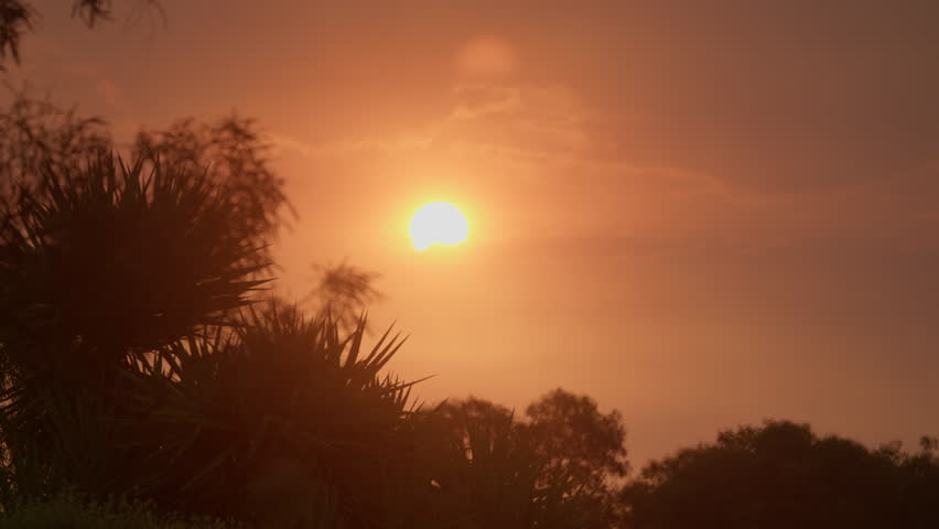 Fiery Red Sun With Hazy Smoke Filled Skyscape Late Afternoon