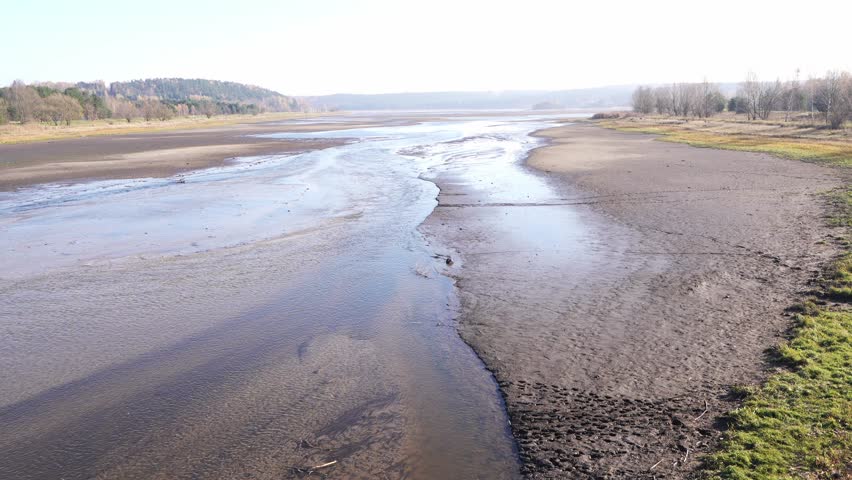 Landscape of a low water level reservoir. The bottom is clearly visible.