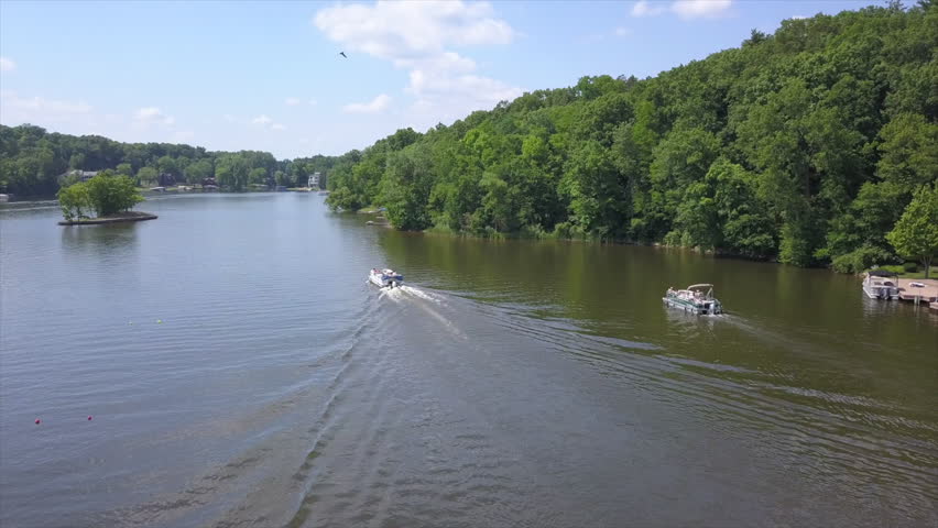 Drone Shot of two Pontoon Boats on Lake Shannon, Michigan