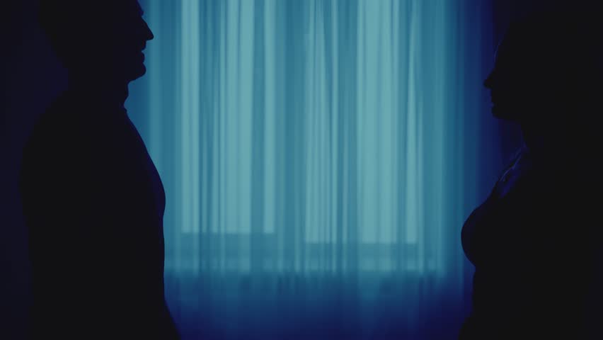 Black silhouette two gothic person, loving couple together man face to face sexy beauty young woman in dark room blue moon light. Adult girl happy guy hugging each other looking at eyes with love 4k