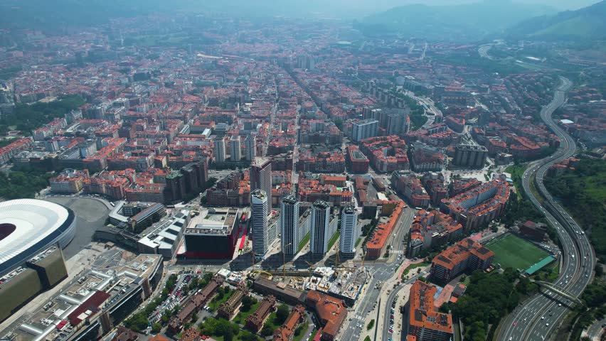 Aerial wide view of the downtown around the capitol city Bilbao on a sunny day in summer in Spain, Basque country