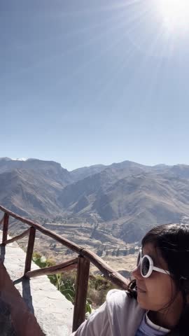 POV selfie of a couple with panoramic Colca mountain views in Arequipa, Peru
