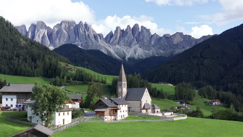 Idyllic Val di Funes in the Dolomites with iconic Santa Maddalena church, Odle Mountains backdrop
