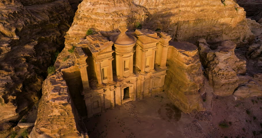 Ad Deir - The Monastery Carved Out Of Rock During Sunset In Petra, Jordan. - aerial