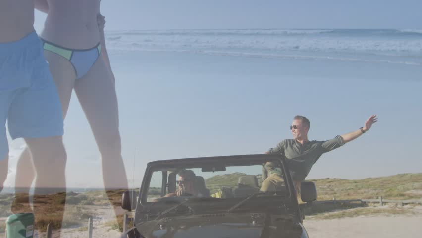 Crossfading scenes showing man standing through Jeep, gesturing toward walking couple for marketing. Coastline, beach, shore, dunes, horizon, ocean, convertible