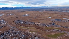 View of Rocky Mountain Metropolitan Airport from an airplane flying the downwind leg with Longs Peak in the distance - Powered by Shutterstock - Get 15% off with code: PIKWIZARD15