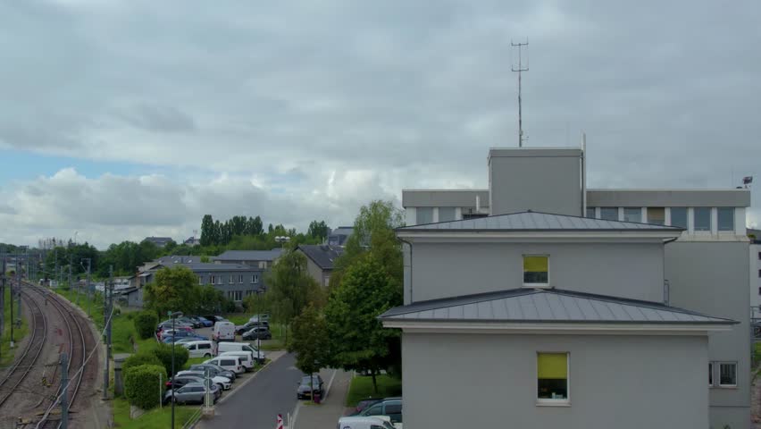 Street view around the city and capitol Luxembourg in the country Luxembourg driving  around the streets from top of a bus on a cloudy day in spring