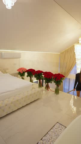 Luxurious woman in luxurious apartment. Concept of luxurious life.