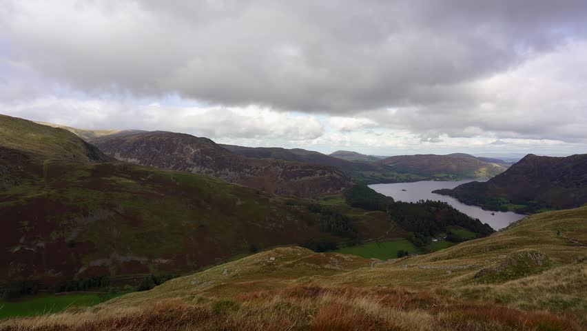 Epic view over the Lake District. Panning view toward Ullswater from St Sunday Crag fell. Cumbria, England, UK