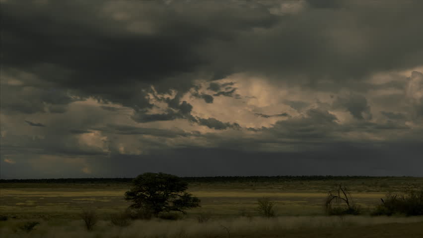 Dramatic Thunderstorm With Lightning Over Field In Mabuasehube, Kgalagadi Transfrontier Park In Botswana. wide shot, time lapse