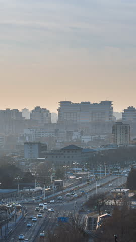 China Beijing Qianmen East Street day-to-night traffic time-lapse footage