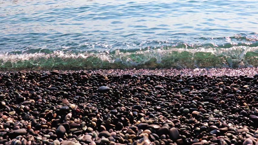 the sea wave and the pebble beach as a great place to relax