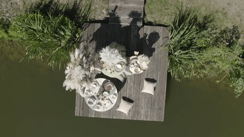 Drone Ascending Over Pond in Summer Landscape