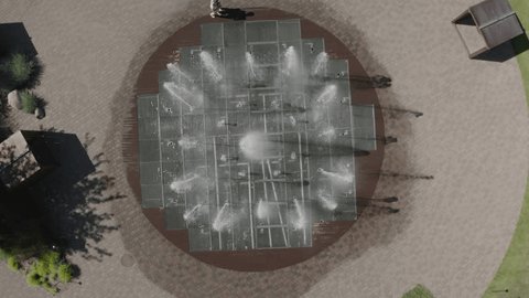 Aerial Rise Spin over Courtyard Fountain