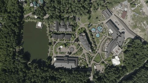 Drone Descending above Hotel Complex Lake