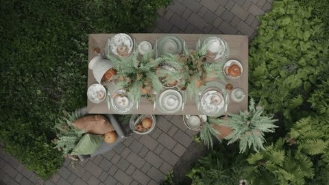 Drone Ascending above Pumpkin Tableware Installation