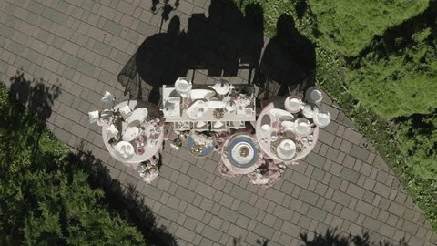 Drone Descending above Elegant Tableware Installation
