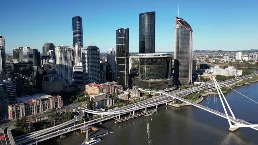 Aerial view of the cityscape of Brisbane, Australia. Urban high-rise buildings of business centers on the riverbank.