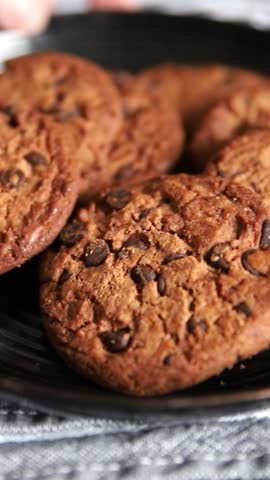Chocolate cookies with chocolate chips sweet dessert homemade baking tasty snack fresh gourmet food background on the table rustic food top view copy space marketing concept photo