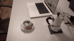 Closed Notebook on Work Desk Beside Laptop and Coffee Cup
Closed notebook placed on desk next to laptop and coffee cup. Home office setup and modern remote work lifestyle concept. - Powered by Shutterstock - Get 15% off with code: PIKWIZARD15