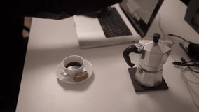 Closed Notebook on Work Desk Beside Laptop and Coffee Cup
Closed notebook placed on desk next to laptop and coffee cup. Home office setup and modern remote work lifestyle concept. - Powered by Shutterstock - Get 15% off with code: PIKWIZARD15