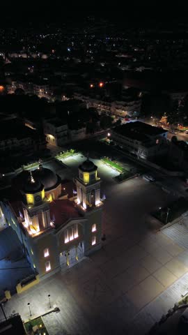 Aerial night footage of Ypapanti christian orthodox church, located at historical center of Kalamata. Bird