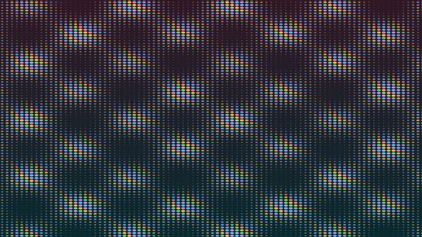 Vibrant pixel grid displayed on monitor in motion