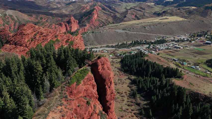Mountain Village Beside Red Canyon Ridge Drone View