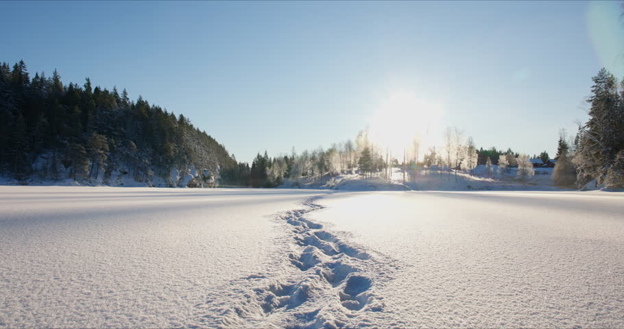Footprint trail across frozen Dausjø lake in Maridalen Oslo winter