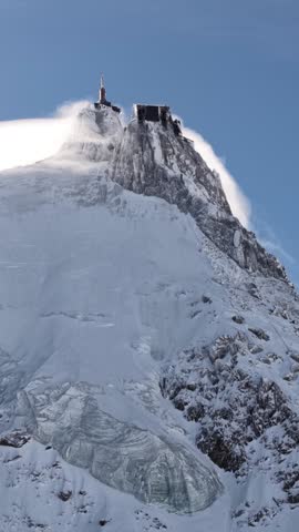 Snowy Aiguille du Midi mountain summit Chamonix France