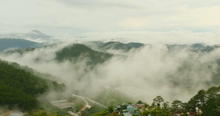 Misty Mountain Landscape in Cloudy Weather.